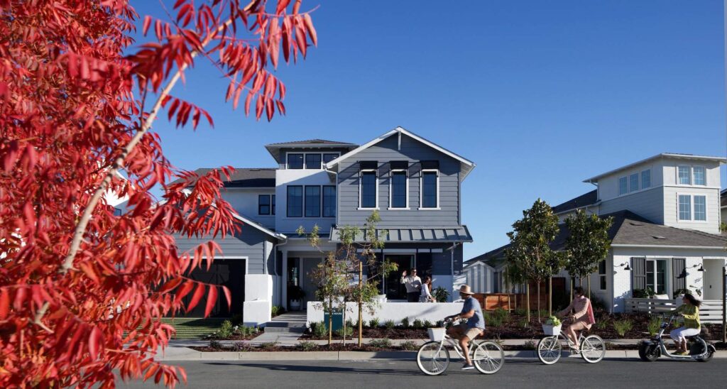 riding bikes in front of homes